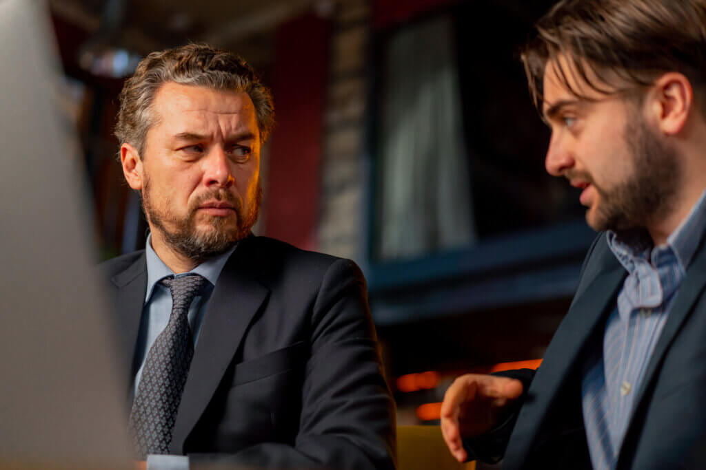 a male witness being questioned about his testimony